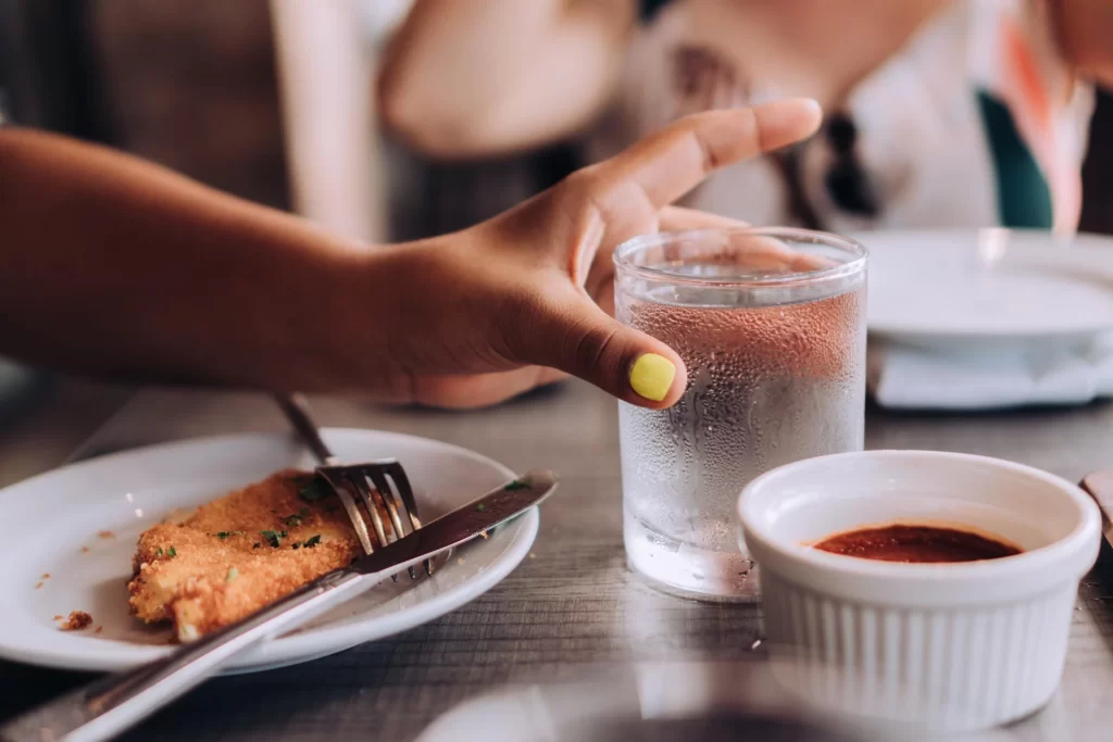 Woman having a glass of water